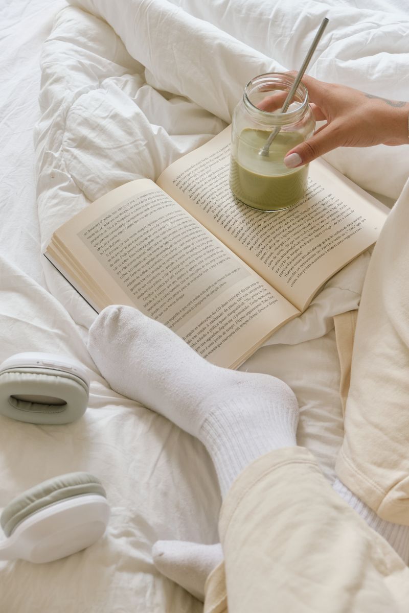 girl sitting to journal and read